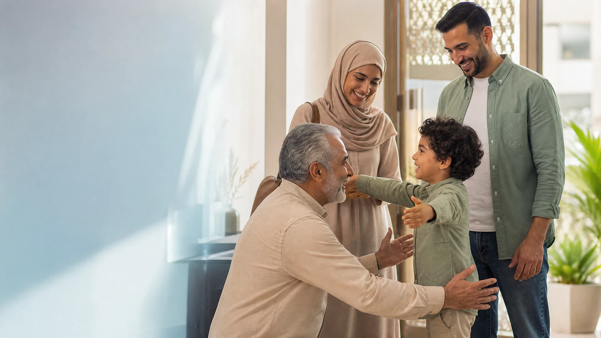 A multigenerational family greeting each other in a welcoming home