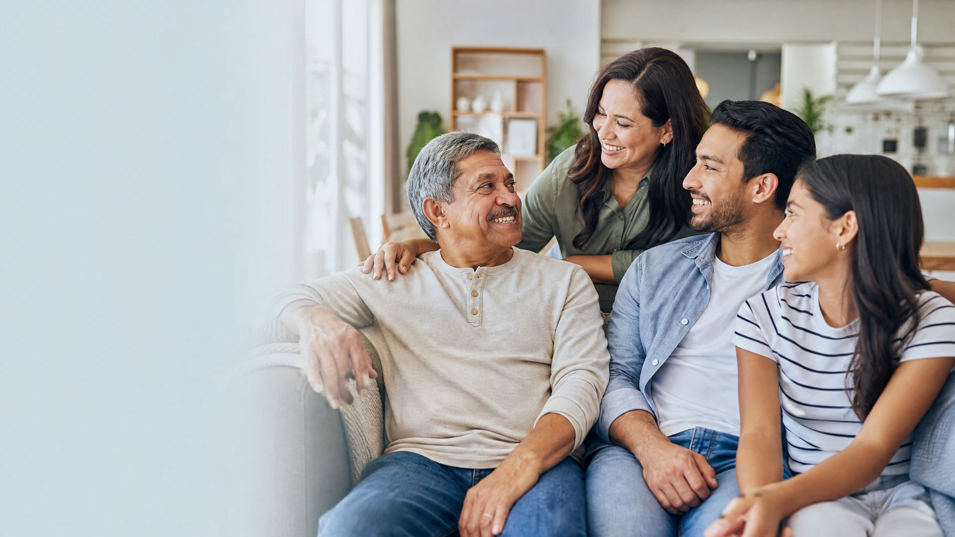 A multigenerational family sharing a relaxed conversation together